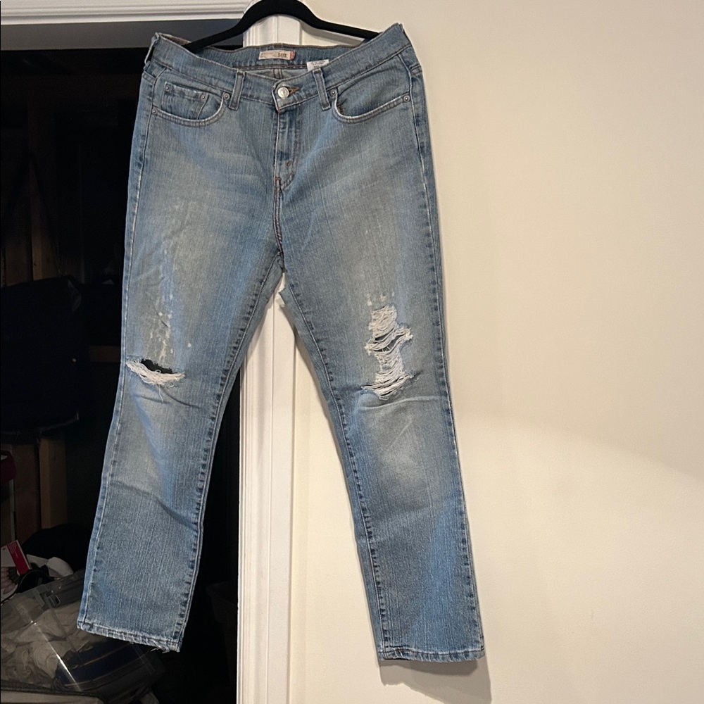 Levi’s Stylish Distressed Light Blue Straight Leg Jeans